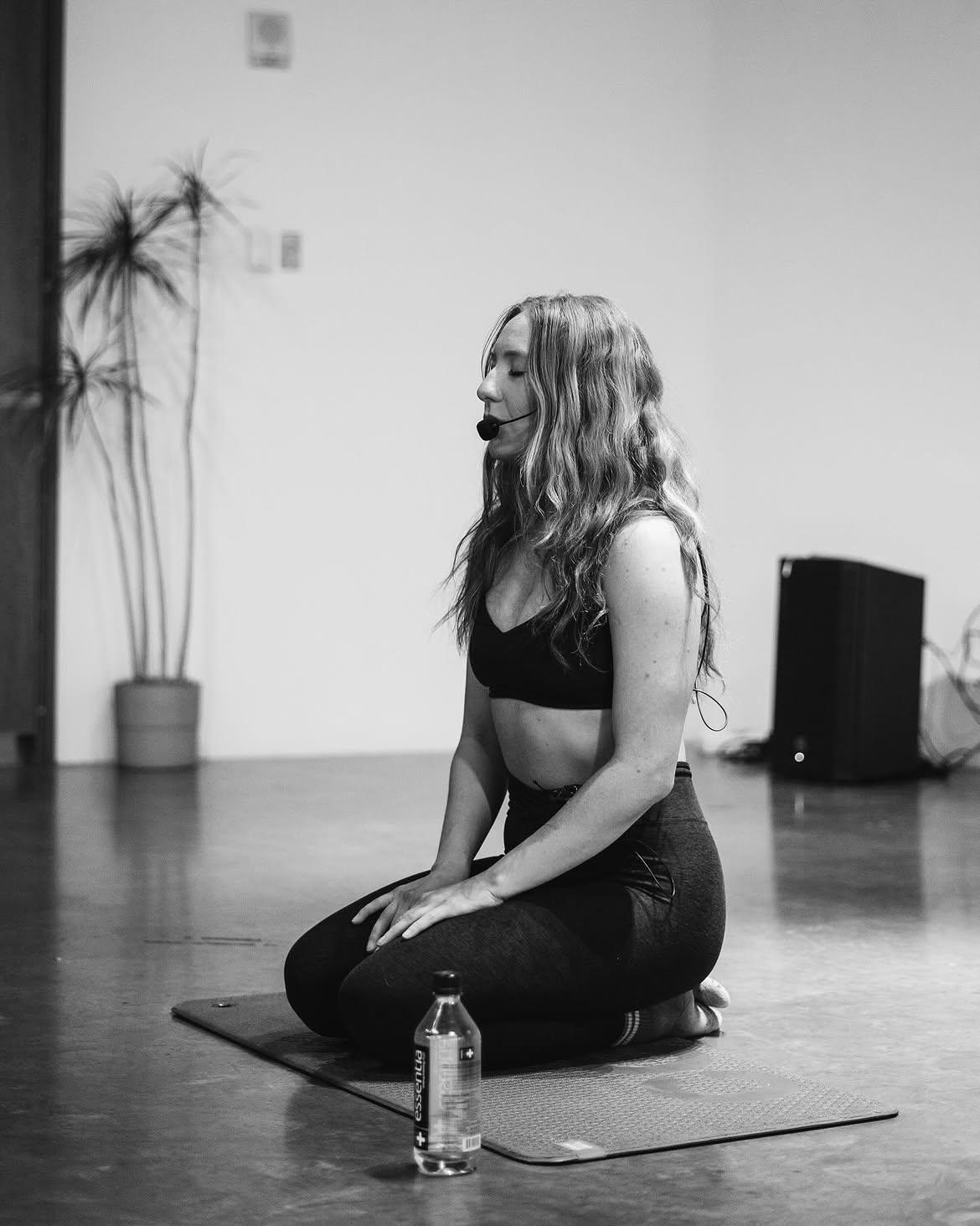 Jen in a quiet moment after class