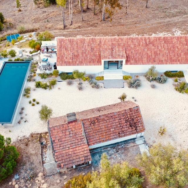 Aerial view of the retreat venue, pool, and grounds